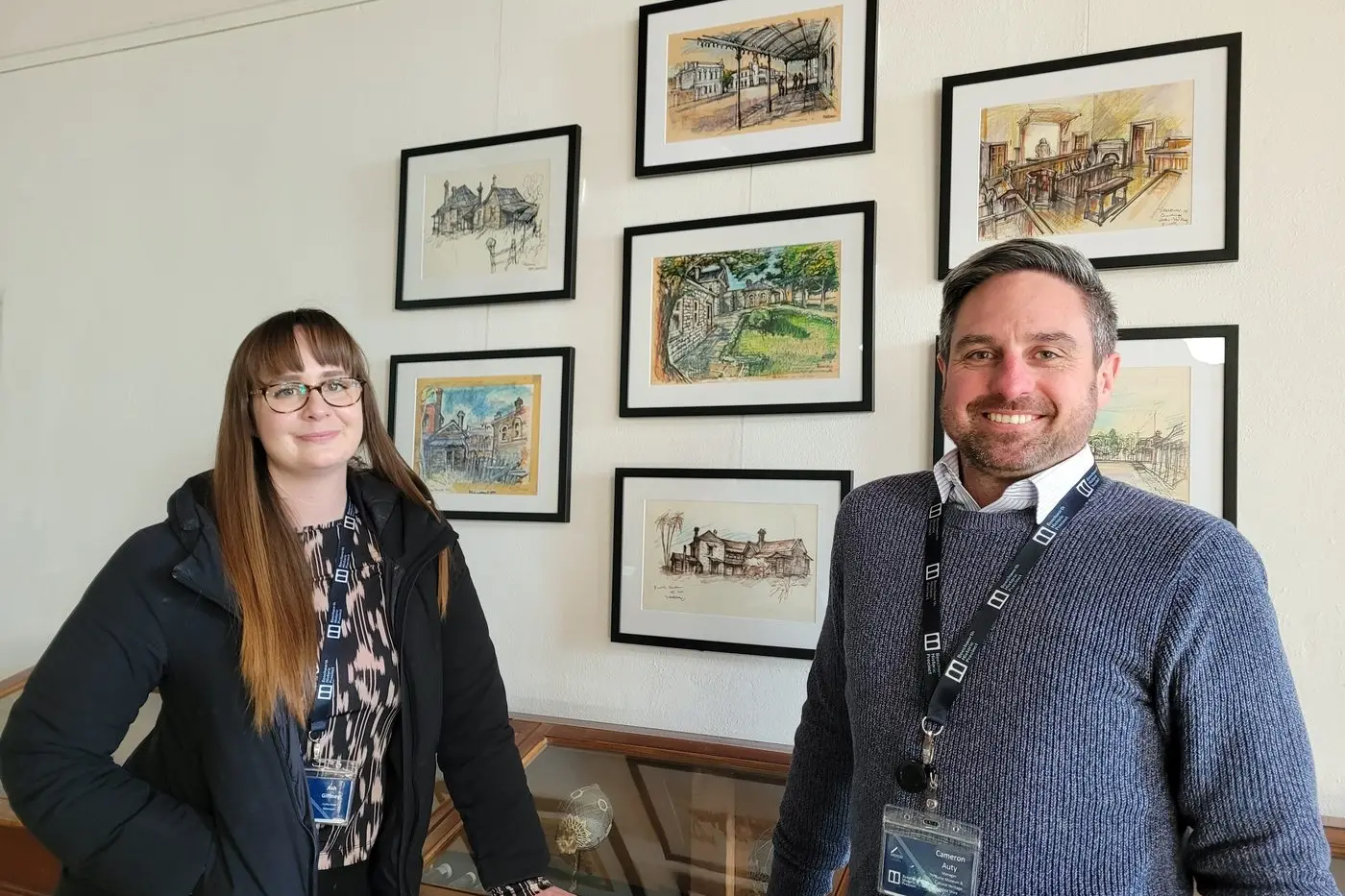 CAPTIVATING STORY: Burke Museum collections manager Ashleigh Giffney with Burke Museum and Cultural Heritage manager Cameron Auty in front of seven of the 25 Ernest Marcuse works on display at the museum. PHOTO: Coral Cooksley Id:28175