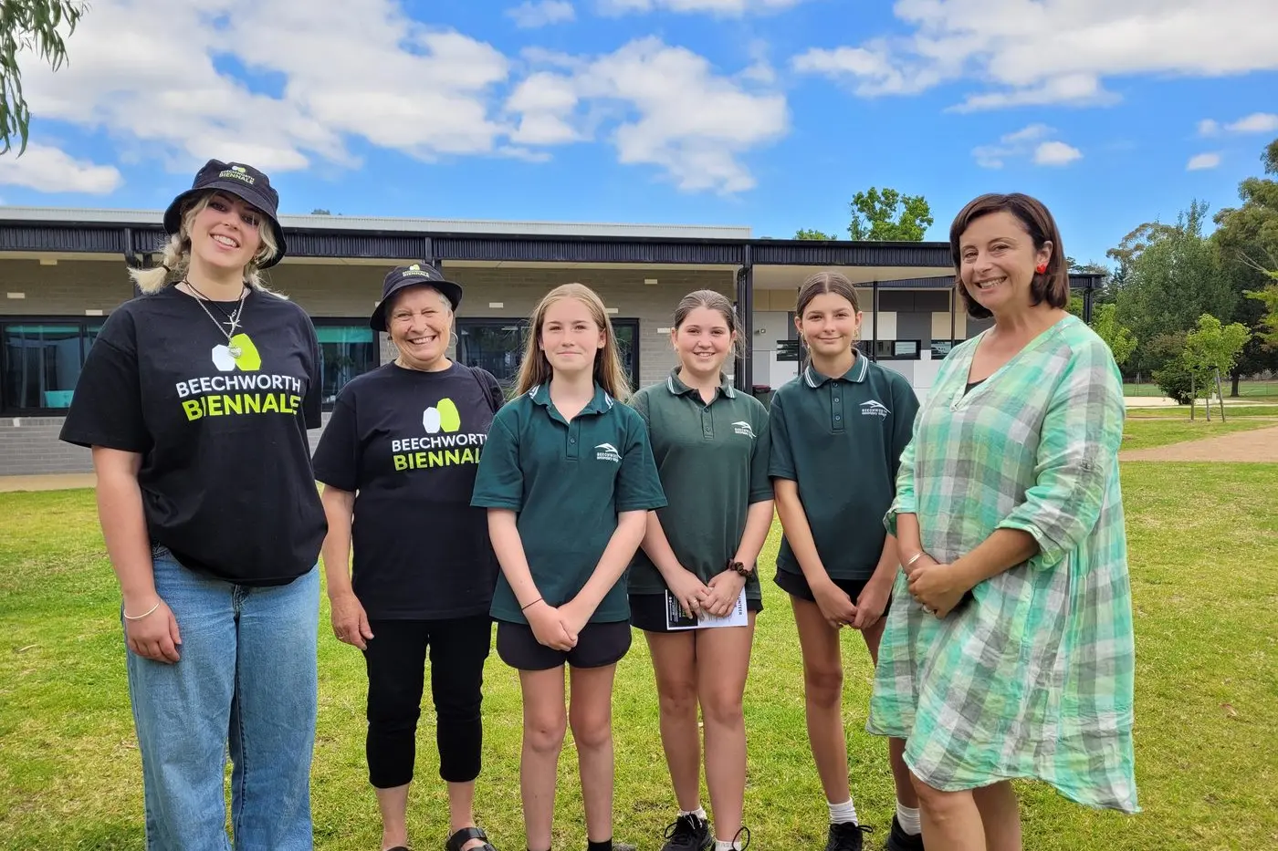EXCITED: Former Beechworth Secondary School (BSC) graduate Rubi Taylor (left), Biennale volunteer coordinator Lesley Milne, BSC Year 8 students Matilda Coleman, Isla Baird and Hazel Woodford with Biennale artistic director Nina Machielse Hunt. PHOTOS: Coral Cooksley