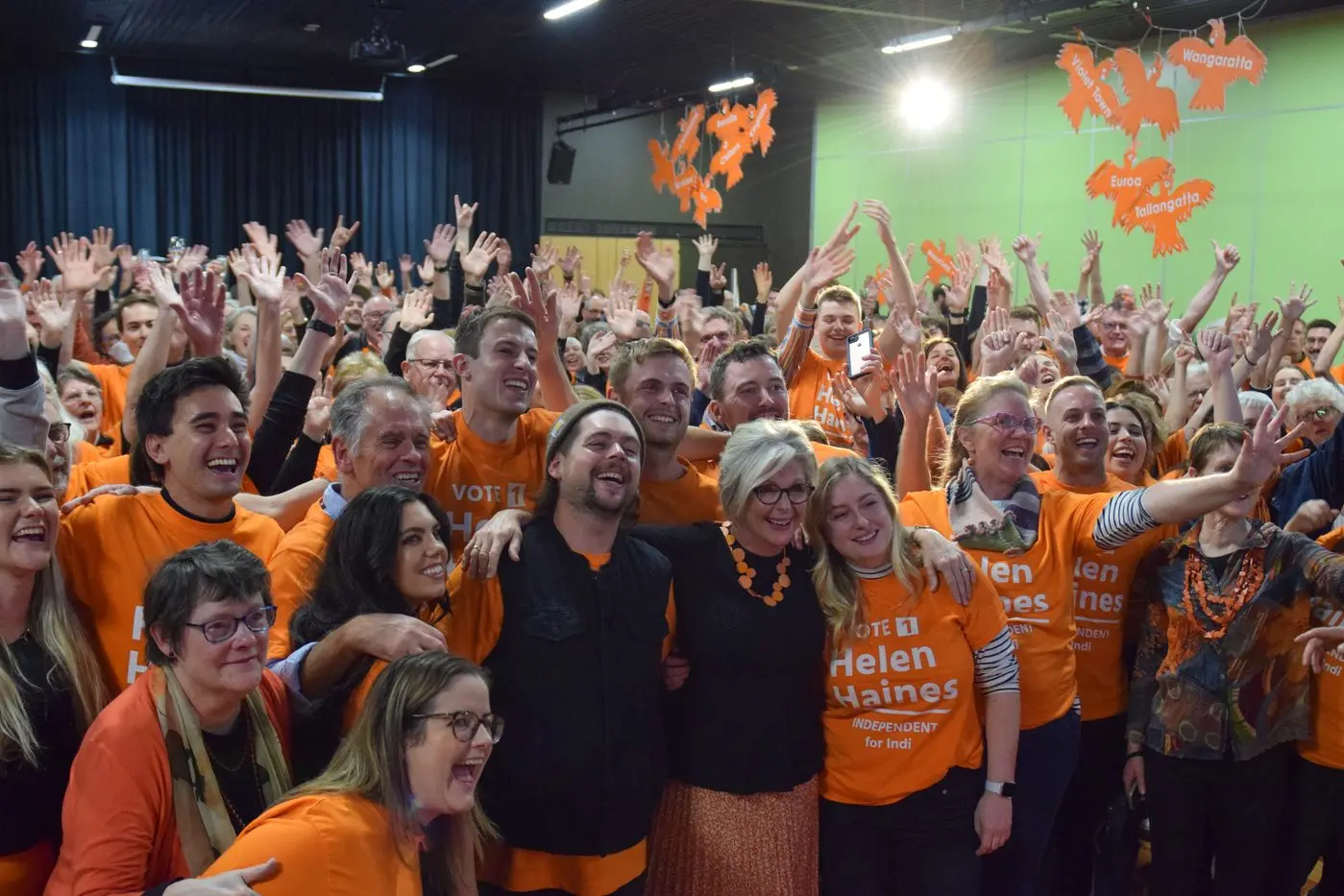 CAMPAIGN CELEBRATION: Independent member for Indi Helen Haines (centre front) celebrated her re\\u2013election to federal parliament with family and campaign volunteers at the Wangaratta Performing Arts Centre on Saturday night. PHOTO: Brodie Everist Id:25168