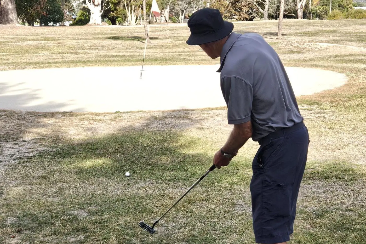 FROM DOWNTOWN: Rod Shaw putts for the green during a round at Beechworth.