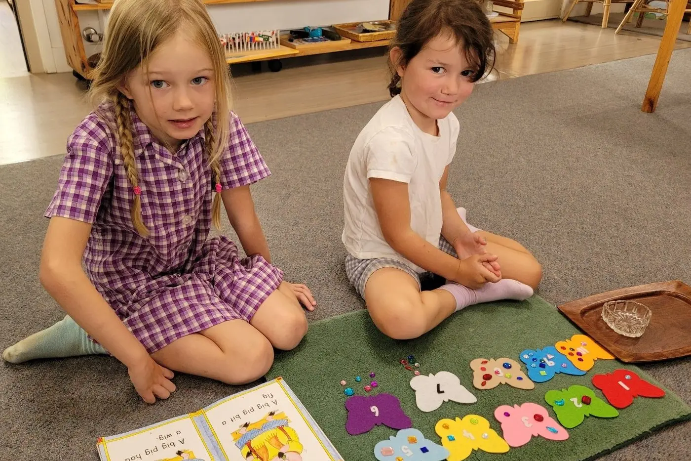 HAPPY: Ellie (left) and Poppy settled back into the classroom as foundation students last week.