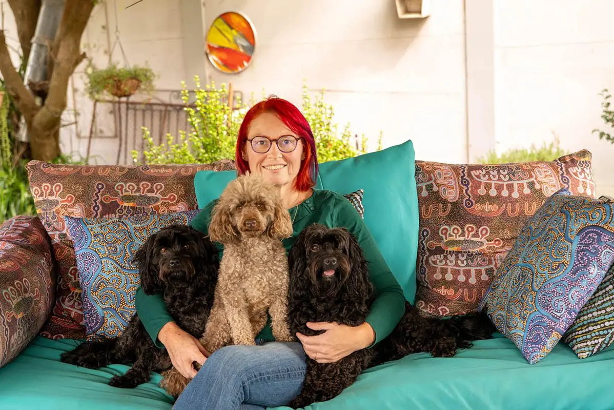 PASSIONATE ABOUT PEOPLE: Wahgunyah\\u2019s Karina Kerr believes everyone has something unique to offer the world through positive connections. Photographed with her three pet pooches Jack Jack (left), Theodore and Franklin.