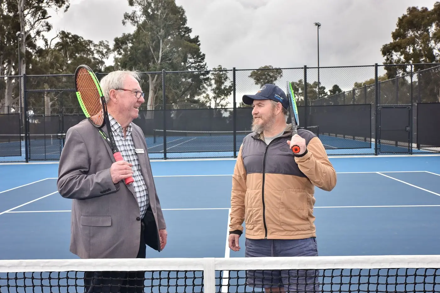 VALUABLE ADDITION: Indigo Shire Council deputy mayor Bernard Gaffney and Beechworth Lawn Tennis Club\\'s Ben Croome launched the Baarmutha Park courts in 2022.