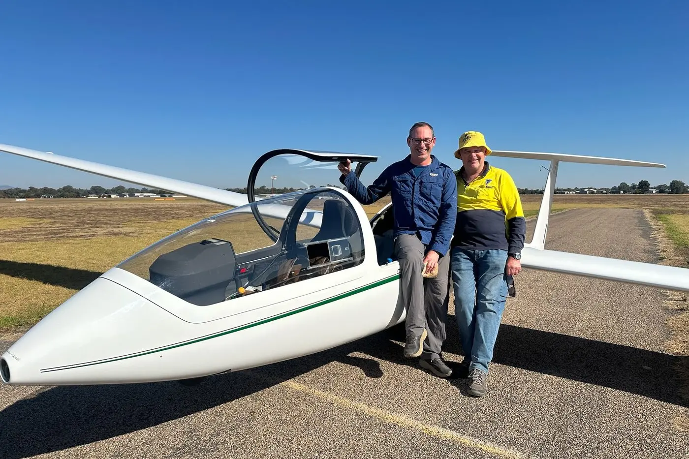IDEAL SURROUNDS: Instructor Matt Woodhouse and duty pilot Jeremy Skuse pictured ahead of a glider flight launch at Benalla.