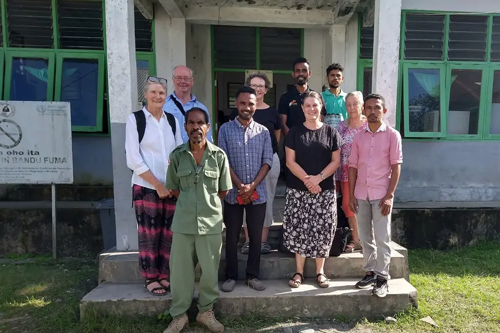 SAFE ARRIVAL: Friends of Lacluta members and friends including (from left) Karen Jones, Brian Thompson, Linda Sexton (centre back) and Barbara Broz (second from right), were welcomed back to Timor Leste by Karen Champlin and local friends.