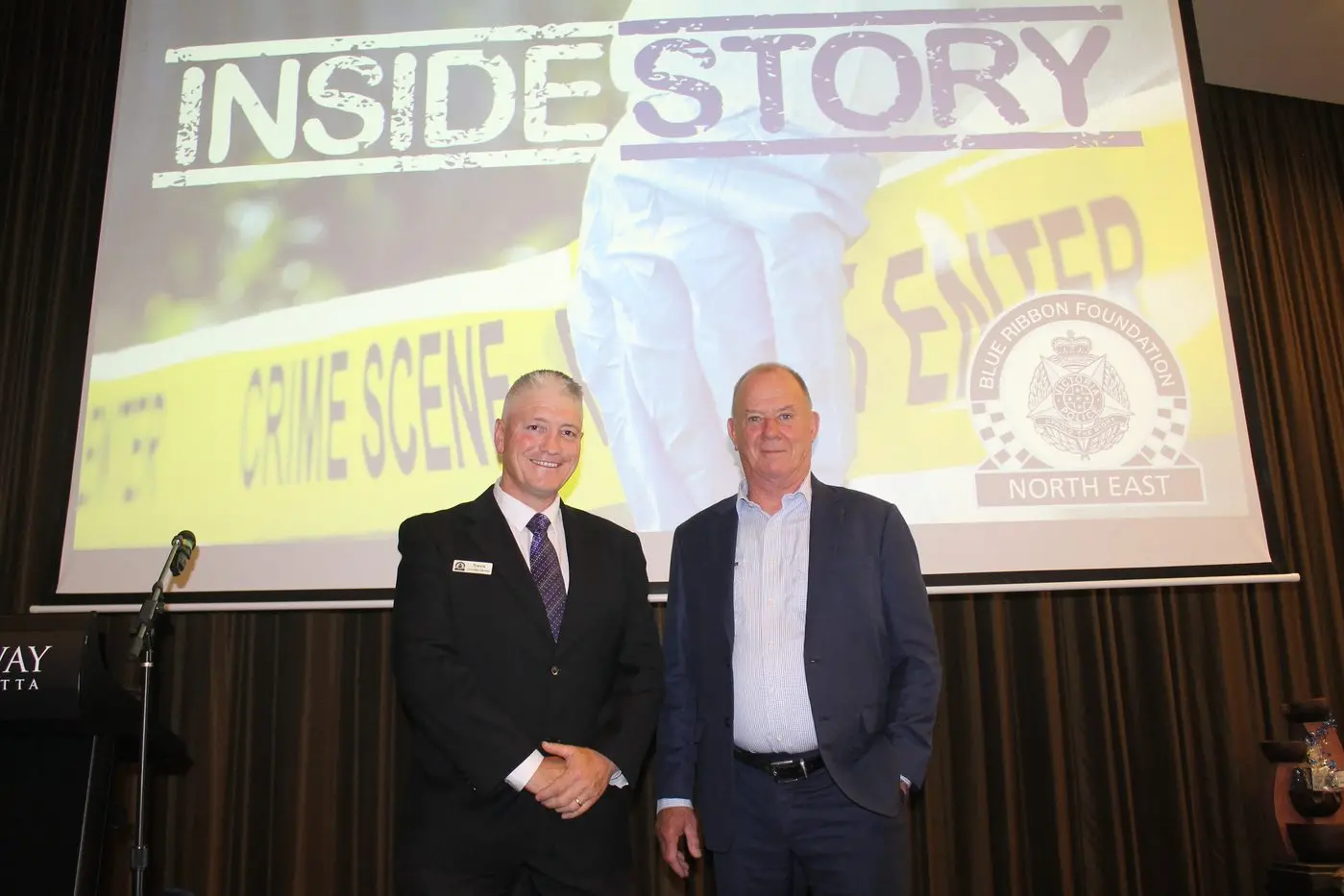 SHARING THE INSIDE STORY: Acting senior sergeant and president of the Victoria Police Blue Ribbon Foundation North East branch Travis Carroll with keynote speaker and veteran member of the Victoria Police Jeff Maher at a fundraising true crime event on Friday evening. PHOTOS: Jordan Duursma 