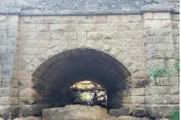 UNDER REPAIRS: A historic stone culvert at Rising Sun Creek remains under assessment, however, a Bailey Bridge will enable transport along Beechworth-Wodonga Road by the end of the month. PHOTO: RRV