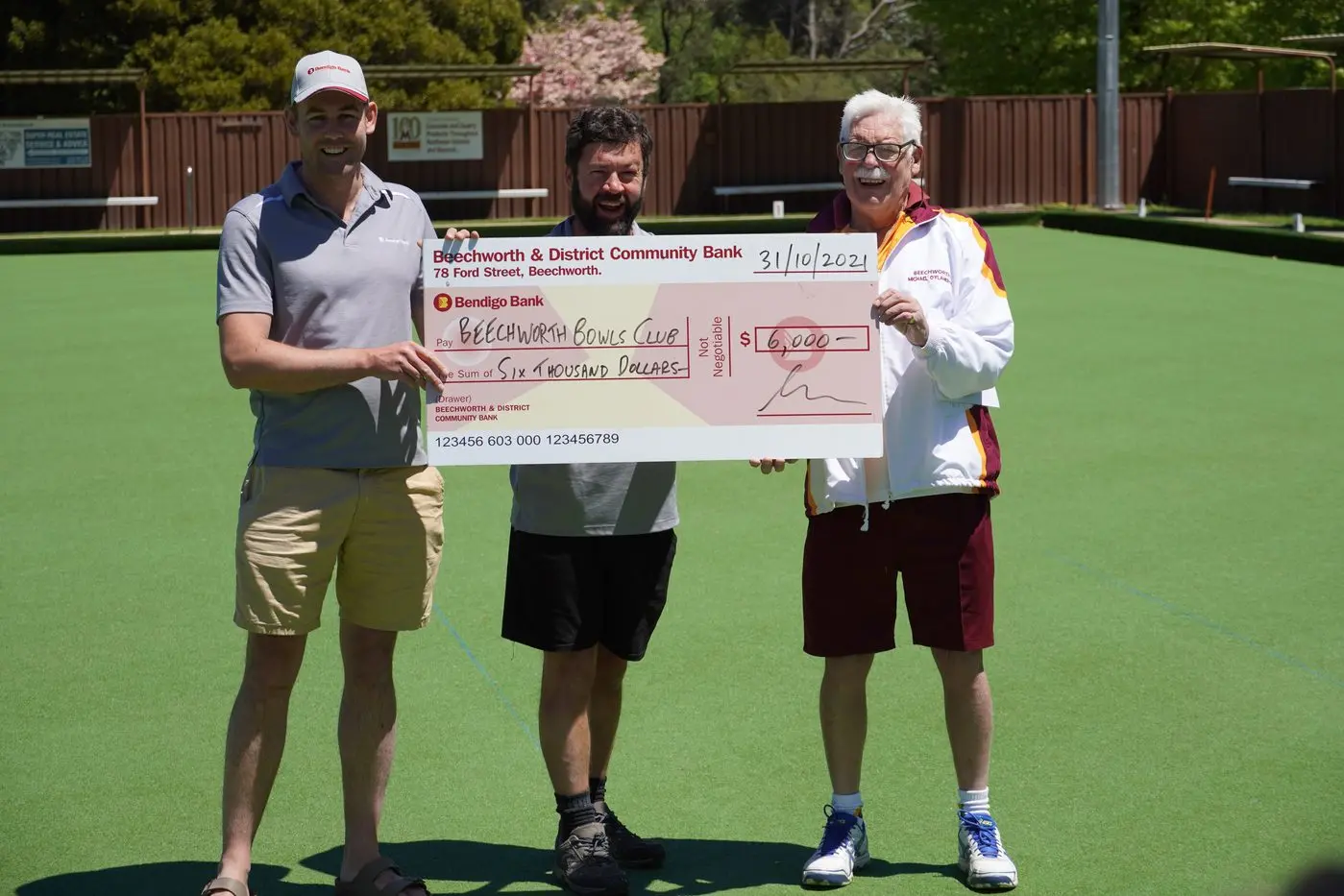 SMILES ALL ROUND: Community Bank Beechworth and District bank manager Sam Johanson (left) with Bank board member Ben Merritt presented a $6000 cheque to Beechworth Bowls\\u2019 president Michael O\\u2019Flaherty on Sunday. 