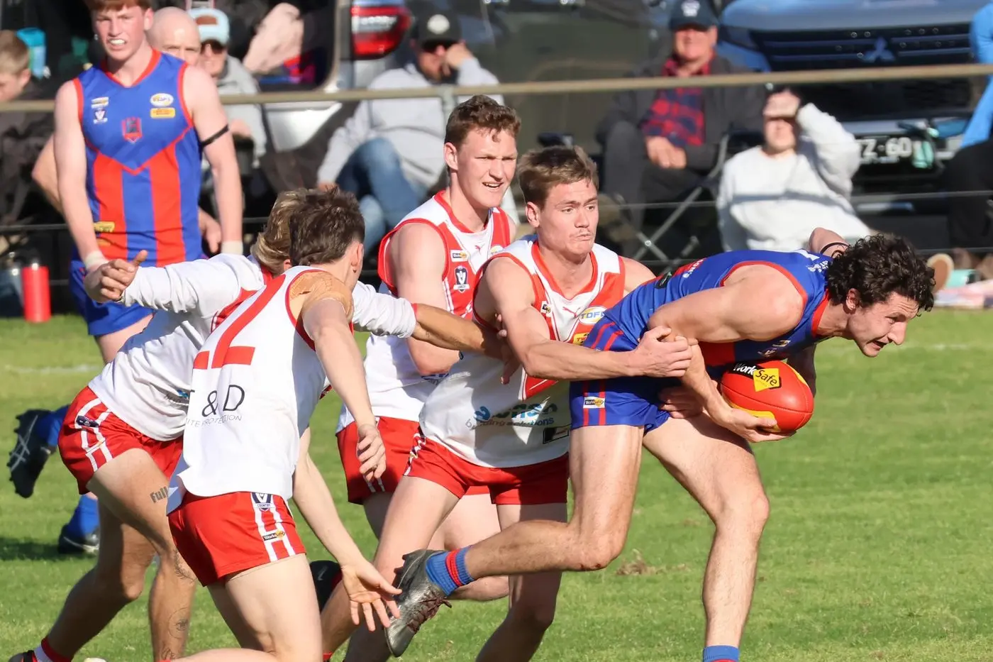 HUNTED DOWN: Brad Fendyk tries to work his way through a swarm of Swans as the \\'Bushies were knocked out of finals on Sunday. PHOTOS: Cassie Buchanan