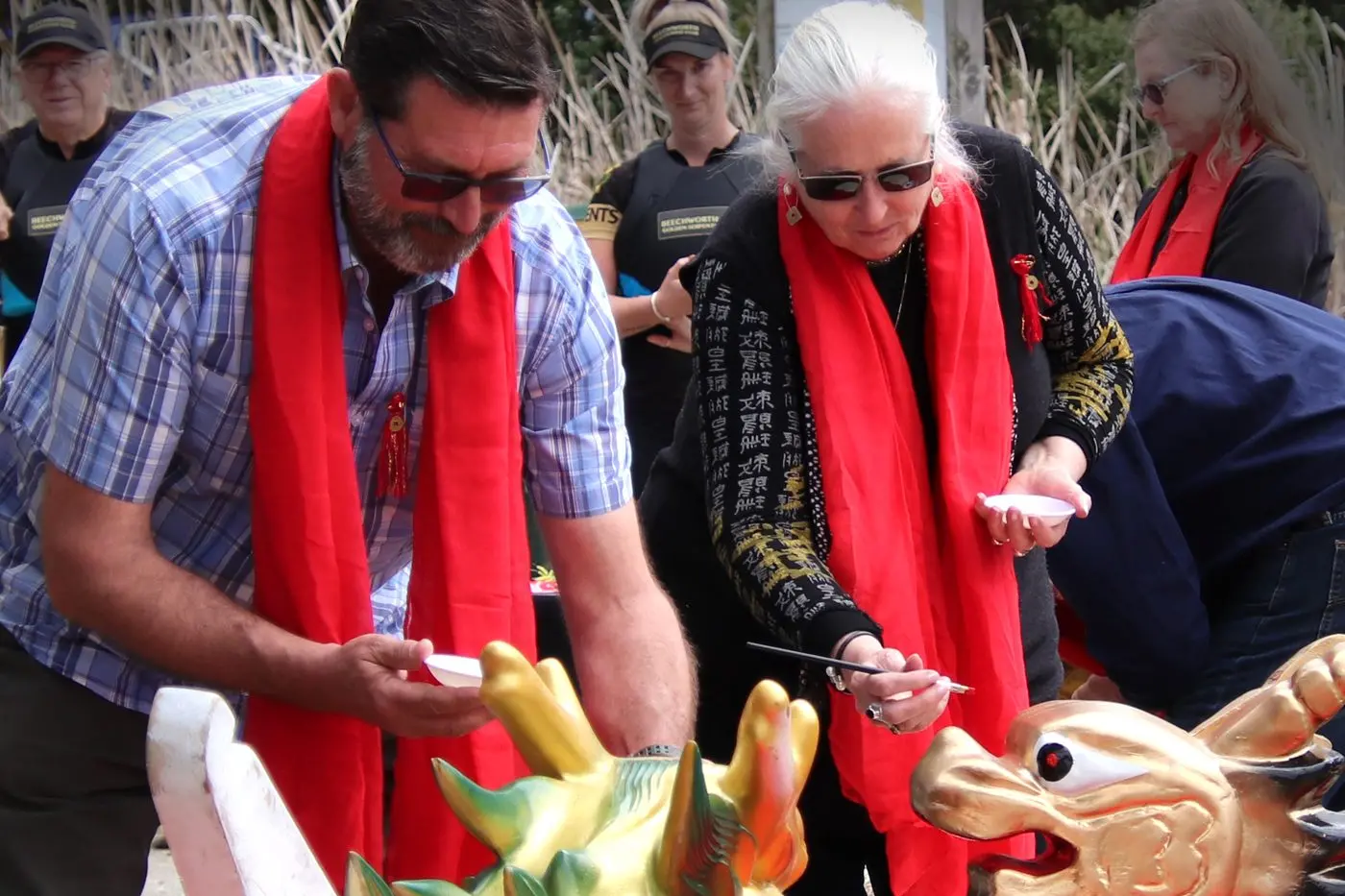DRAGONS AWAKENED: Invited guests Benambra MP Bill Tilley and Beechworth Secondary College principal Trish Broom helped perform the \"Awakening the Dragons\" ceremony. Id:31756