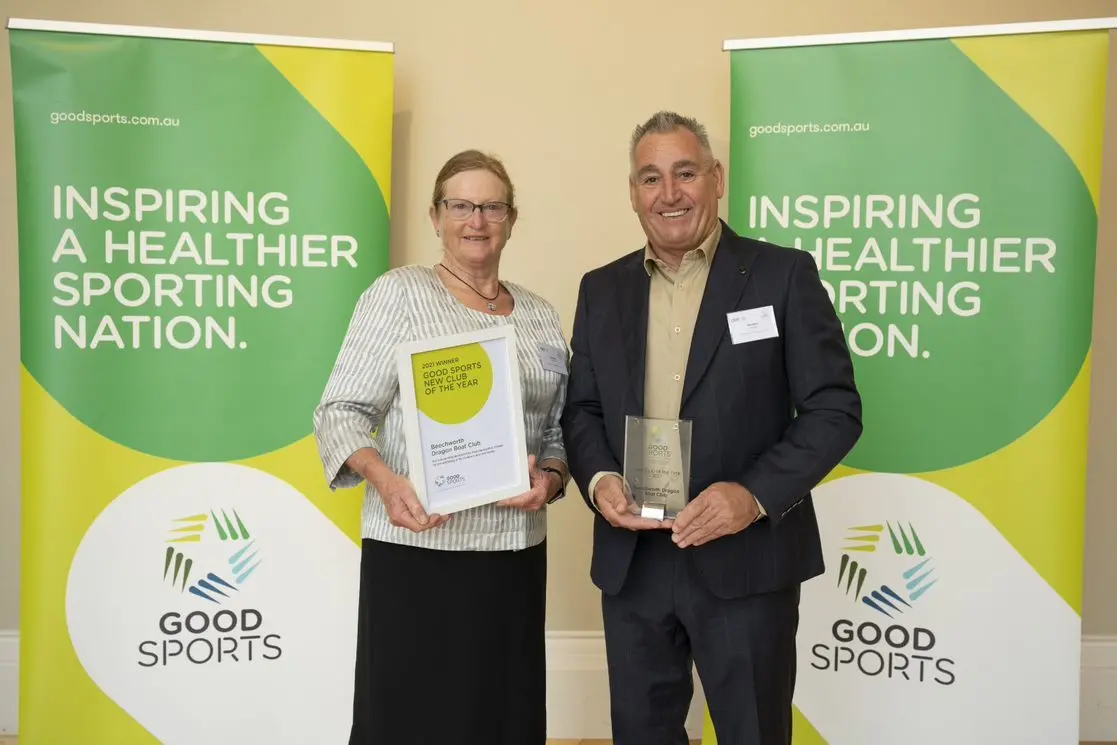 FIRED UP: Beechworth Dragon Boat Club secretary Christine Gabriel and club president Brendan Maher with their Good Sports ward. Id:22005