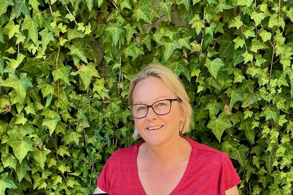 REWARDING: Beechworth\\u2019s Helen Lowndes enjoys helping customers find the right product as well as being able to take her pet pooch Inka to work.