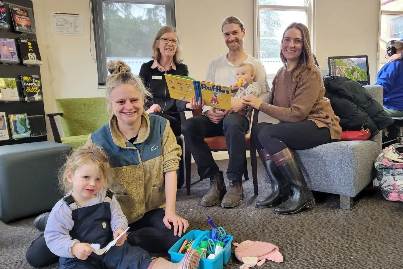 FUN: Beechworth\\u2019s Stephanie Eagle with her toddler Amelia De Freitas (front), Beechworth librarian Margaret Citroen (back left) with her son visiting from Melbourne Jonathon Citroen with six-month old baby Caspian and wife Isabelle Carr at Beechworth Library on Saturday.