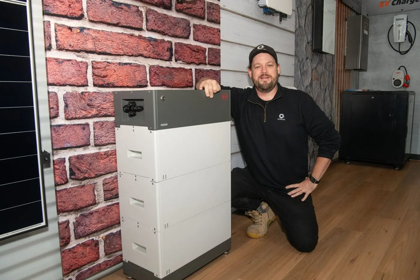 SET TO CHARGE: Blake Smith from Solargain Wangaratta said there has been a big surge in local home battery attachment rates since the federal government\\'s announcement of their subsidy program. PHOTO: Kurt Hickling