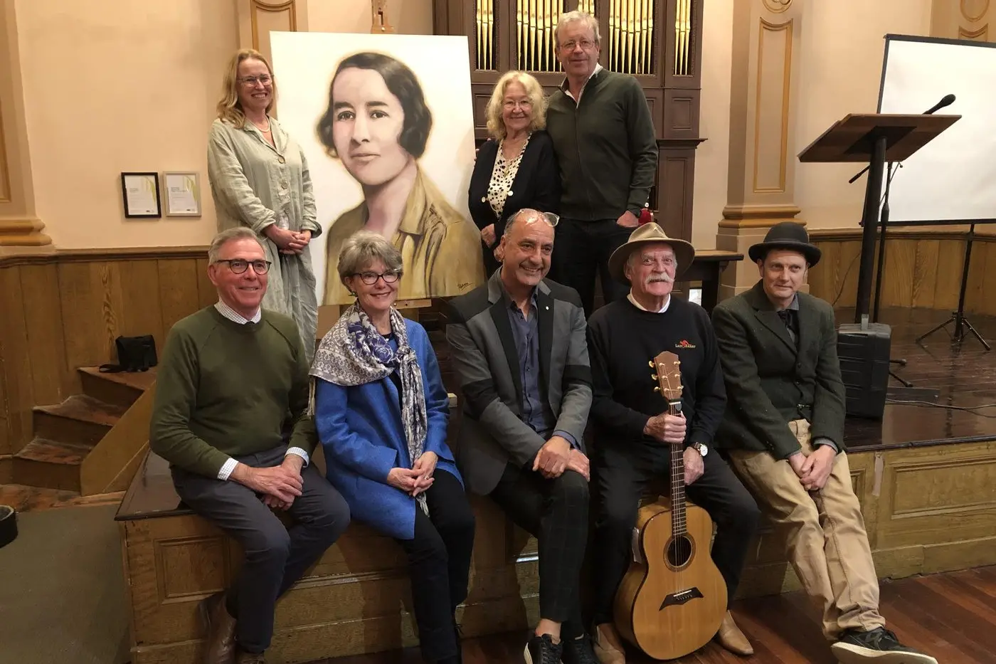LIFE-SAVING WORK: Josephine Samuel-King (back left) with the portrait of her grandmother Dame Jean Macnamara, her mother Merran Samuel and brother Fraser with presenters Jamie Kronborg (front left), Kate Sutherland, George Petrou, musician Mark Stephens \\u2013 who wrote and performed a song honouring Dame Jean \\u2013 and Burke Museum Friends\\u2019 president Daniel Goonan. PHOTO: Gary Coombe\\n