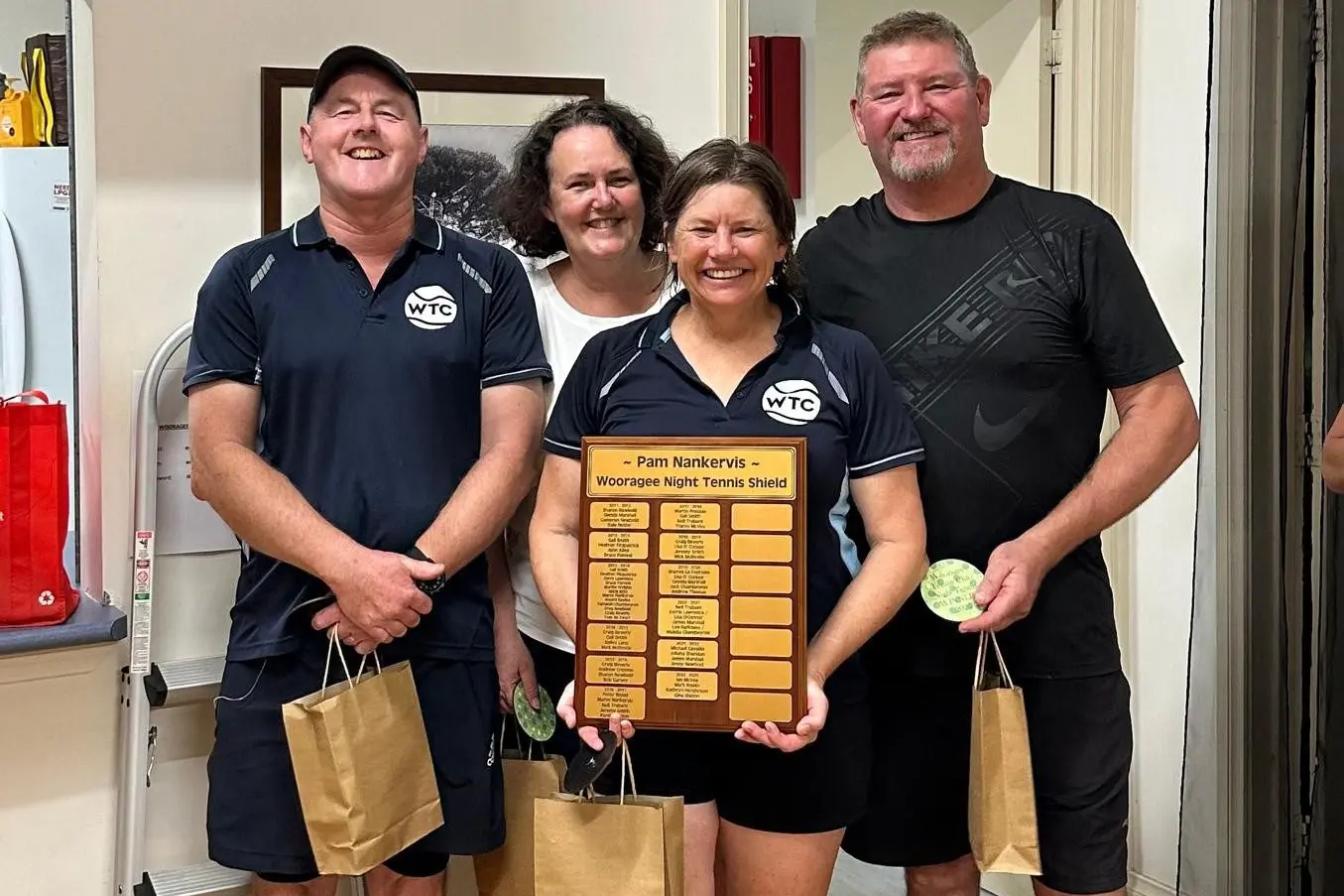 PRIME TIME CHAMPIONS: The Missing Links grand final winning team of the Wooragee Night Tennis competition laughed their way to victory on Tuesday night. Pictured are team members Ian McVea (left), Fiona Stringer, Ali Maher and Bob Garvey.
