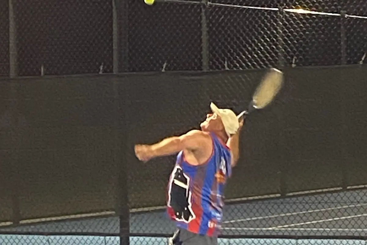 ON THE ATTACK: Team NorMac Rural\\'s John Sheehan prepares for an aggressive serve.