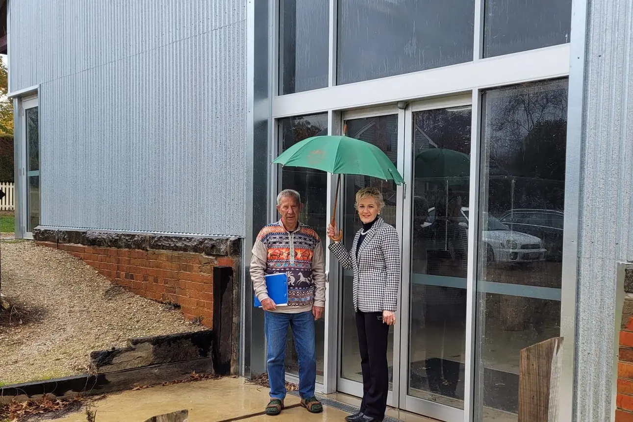 FRUSTRATED: Old Cranks Motor Club member Leigh Privett with Beechworth History and Heritage Society\\'s Elizabeth Mason at the vacant railway goods shed considered to be a suitable location for the historic carriage collection. PHOTO: Coral Cooksley Id:25692