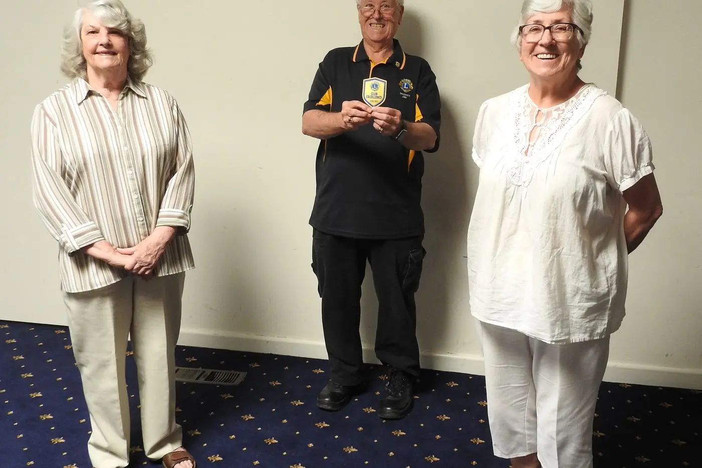 Beechworth Lions Club members Christine Luckman, John Eldrid and Iris Mannik celebrate their Club Excellence Award.