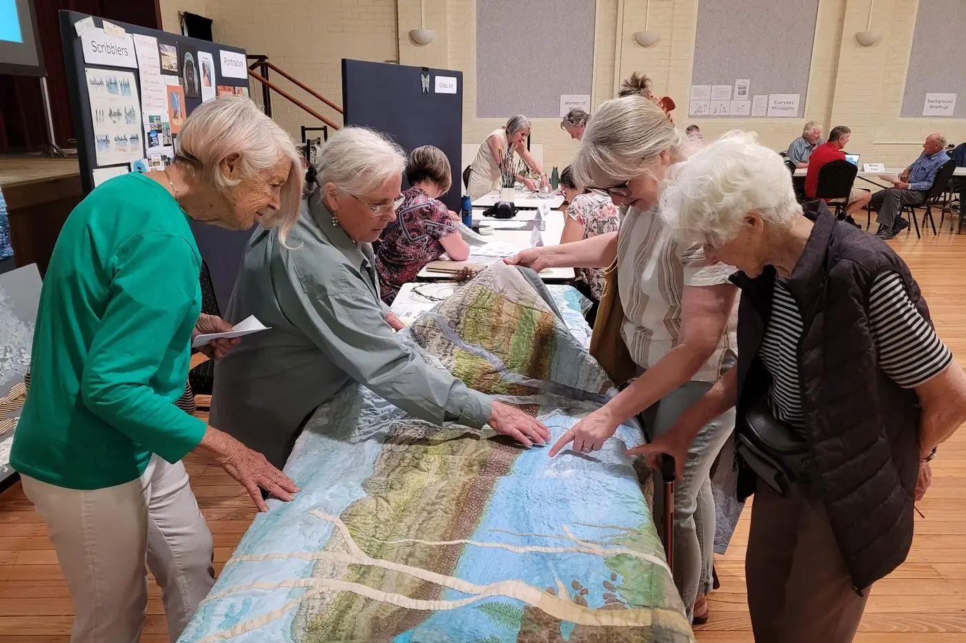 INTEREST CAPTURED: Indigo U3A\\'s Jennie Waldron (left) with \\'No Rules \\u2013 Fibre Art and Embroidery\\' tutor Jennifer Cowie chatted to new members Lisa Kirton and Dawn Kirton at last week\\'s Indigo U3A enrolment day. PHOTO: Coral Cooksley Id:36704
