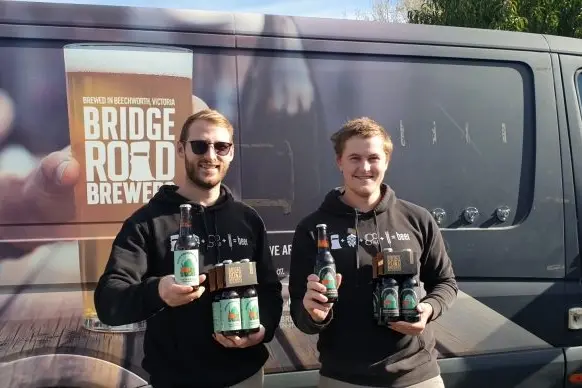 SHOWCASED: Beechworth\\u2019s Kane Niklaus and Corey Voigt in a pre-isolation photo promoting two new harvest beers made for the annual High Country Hops Festival innovatively turned into a mini virtual one tonight. PHOTO: supplied. 