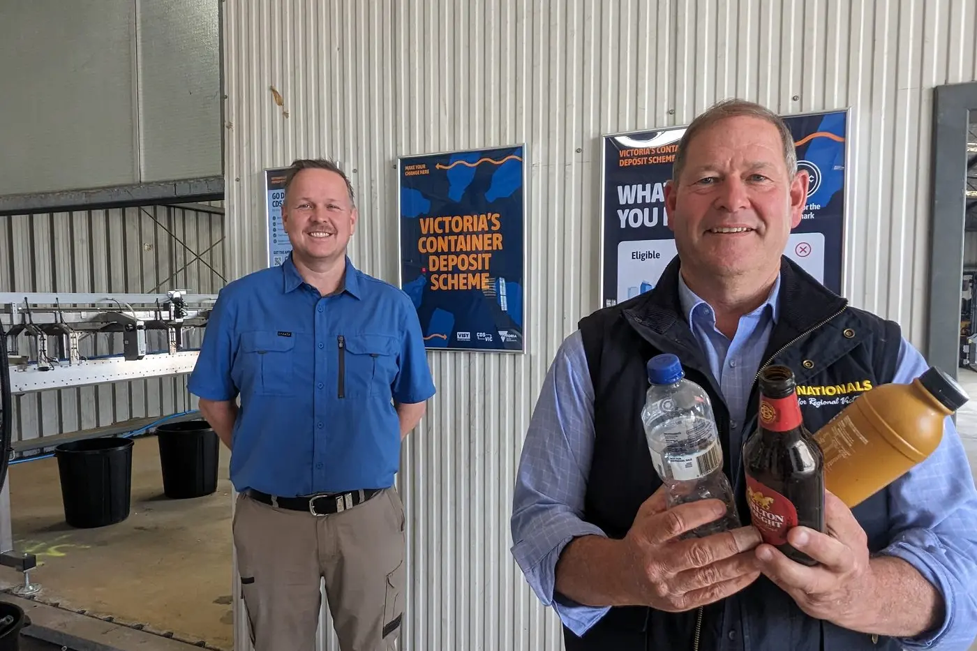 MONEY IN CONTAINERS: \\'Exchange Depot\\' managing director Damien Woolford showed Ovens Valley MP Tim McCurdy around Wangaratta\\'s Newman Street automated depot last week. PHOTO: Ryan Malcolm
