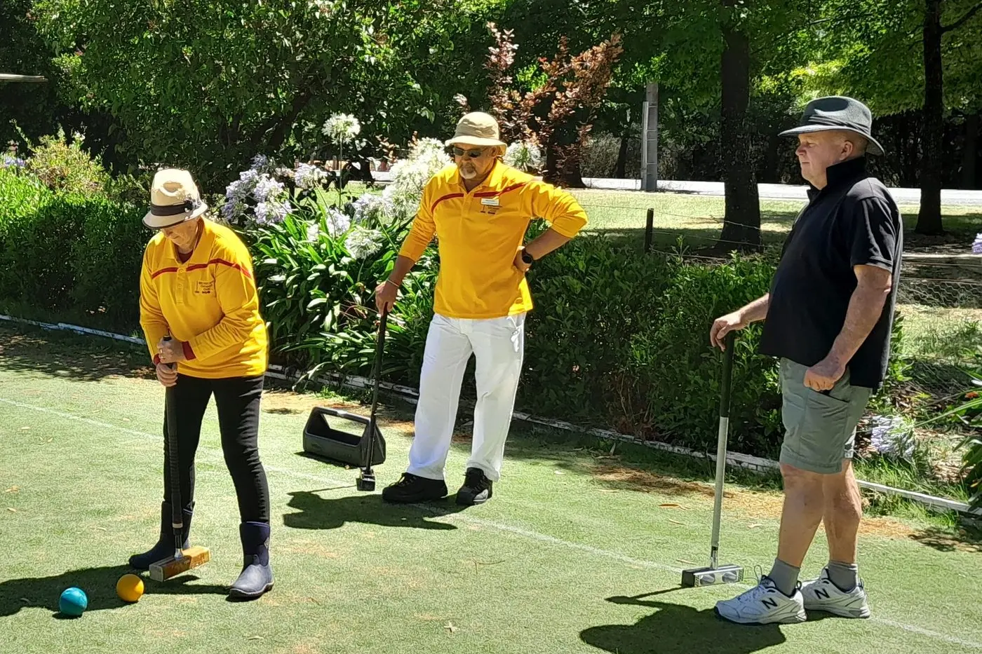 REFINING SKILLS: Beechworth Croquet Club members Wendy Kelly and David Box took part in a recent elite coaching clinic held at the Beechworth greens. Id:37385
