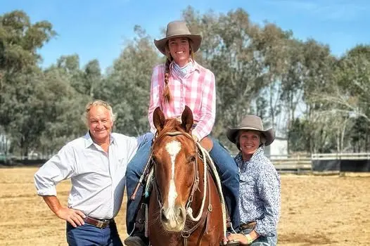 FAMILY AFFAIR: Proud parents Graham and Anne Maree Forge with daughter Tup at their Oxley cattle property.