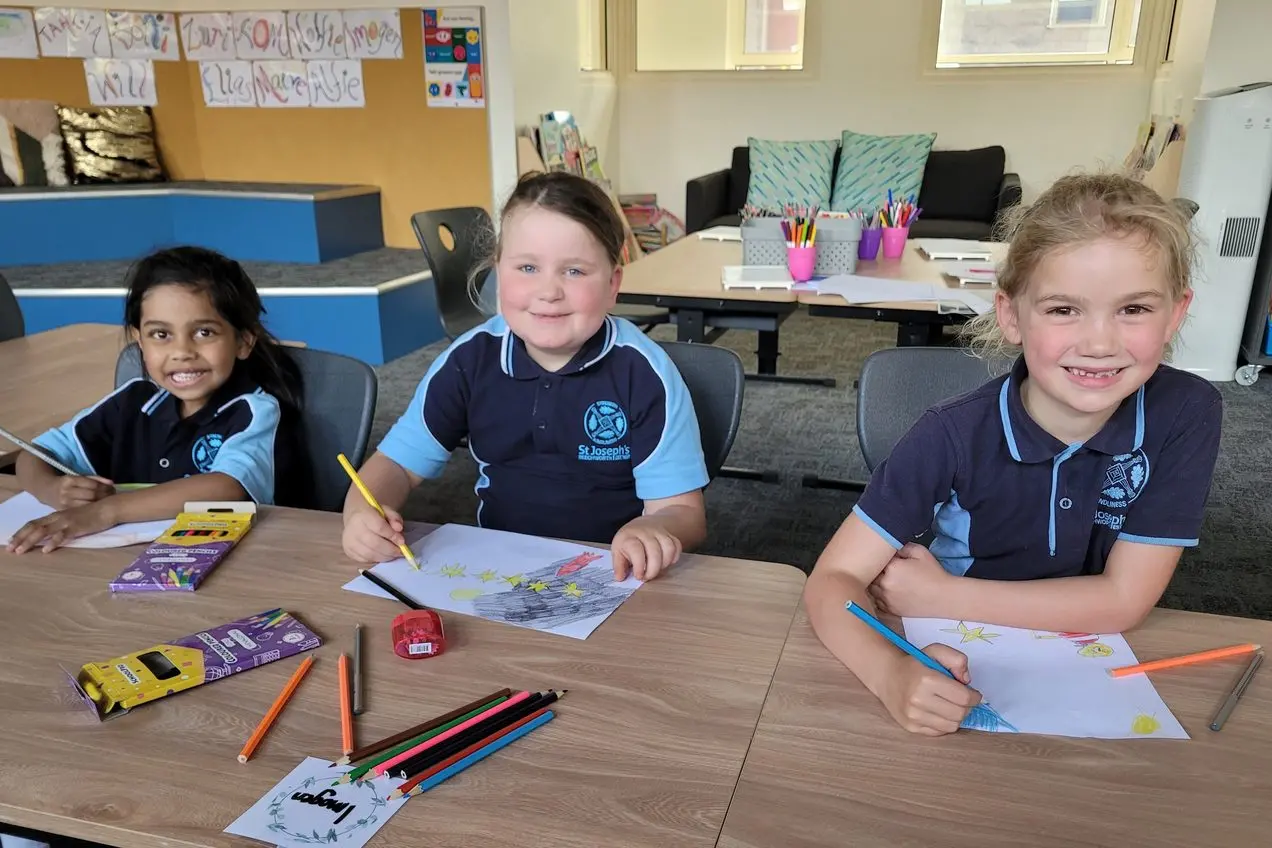 EXCITED: Five-year-old youngsters at St Joseph\\u2019s Primary School in Beechworth Tahlia (left), Imogen and Dorothy began their primary school education journey last Friday. PHOTO: Coral Cooksley