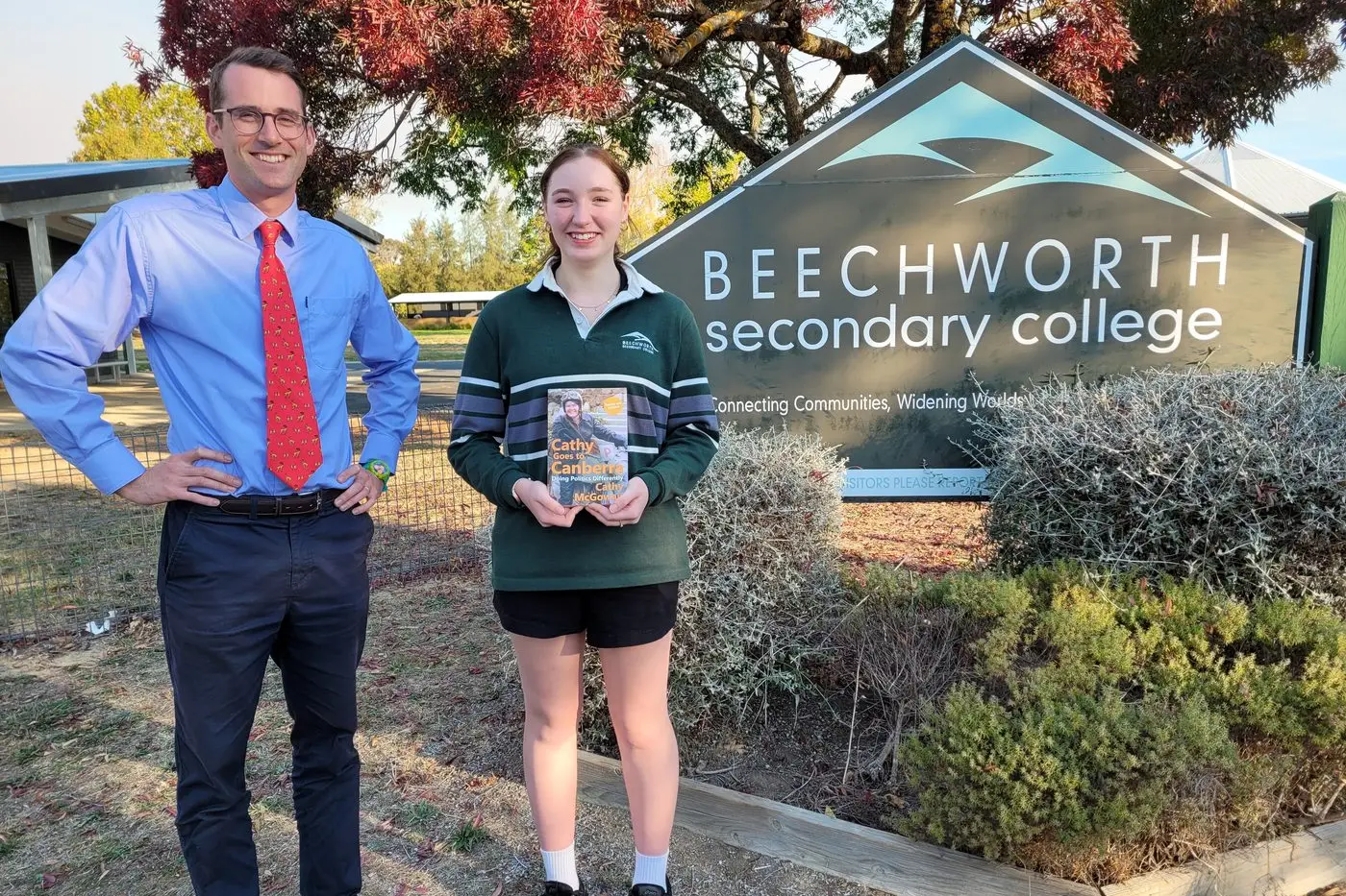 REWARDED: Year 10 student Amy Schilling holds a copy of her book \\u2018Cathy goes to Canberra,\\u2019  with Humanities teacher Finn Pedersen at the college. PHOTO: Coral Cooksley
