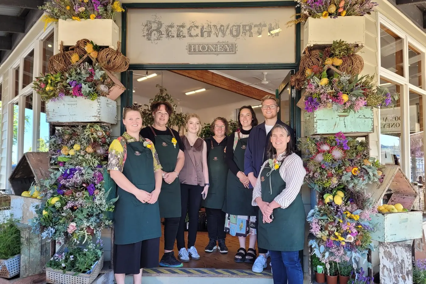 TEAM EFFORT: Beechworth Honey staff Liana Beatson (left), Amanda Hausler, Charlotte Cunningham, Michelle Christesen, Jayden Sinclair with director Jodie Goldsworthy at the launch on \\u2018Pollinate\\u2019 at the shop last Friday PHOTOS: Coral Cooksley