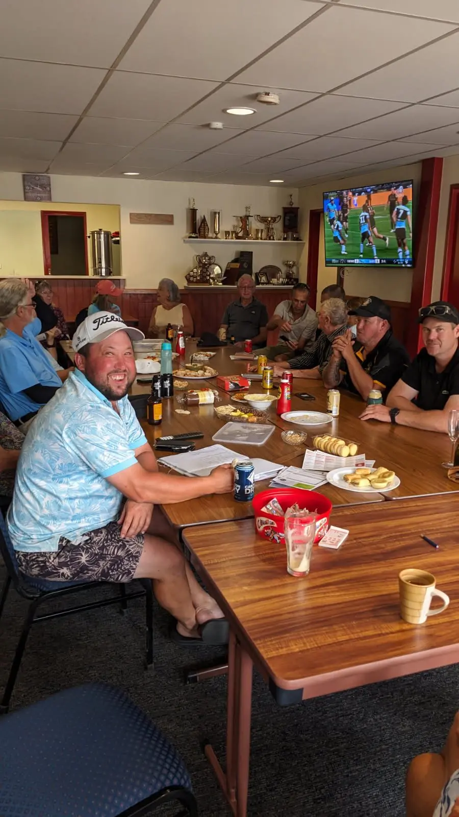 CHEERY FEED: Players enjoying their afternoon tea after golf on Sunday. \\n