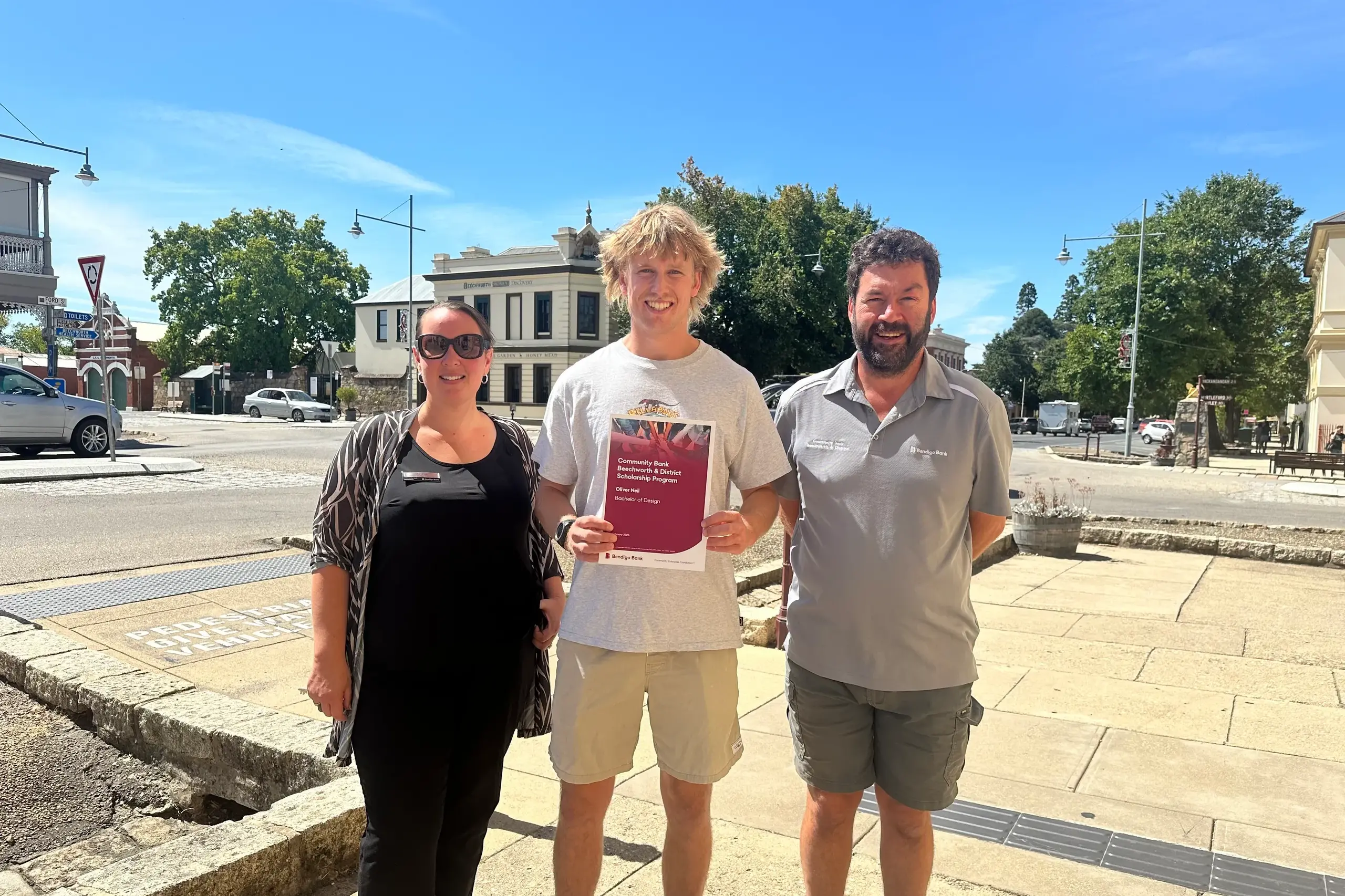 <p>GRATEFUL: A thrilled Beechworth\\u2019s Ollie Neil photographed with past Community Bank Beechworth & District (Bendigo Bank) manager Theresa Cowan and the bank\\u2019s Board chair Ben Merritt received a scholarship earlier this year. </p>\\n