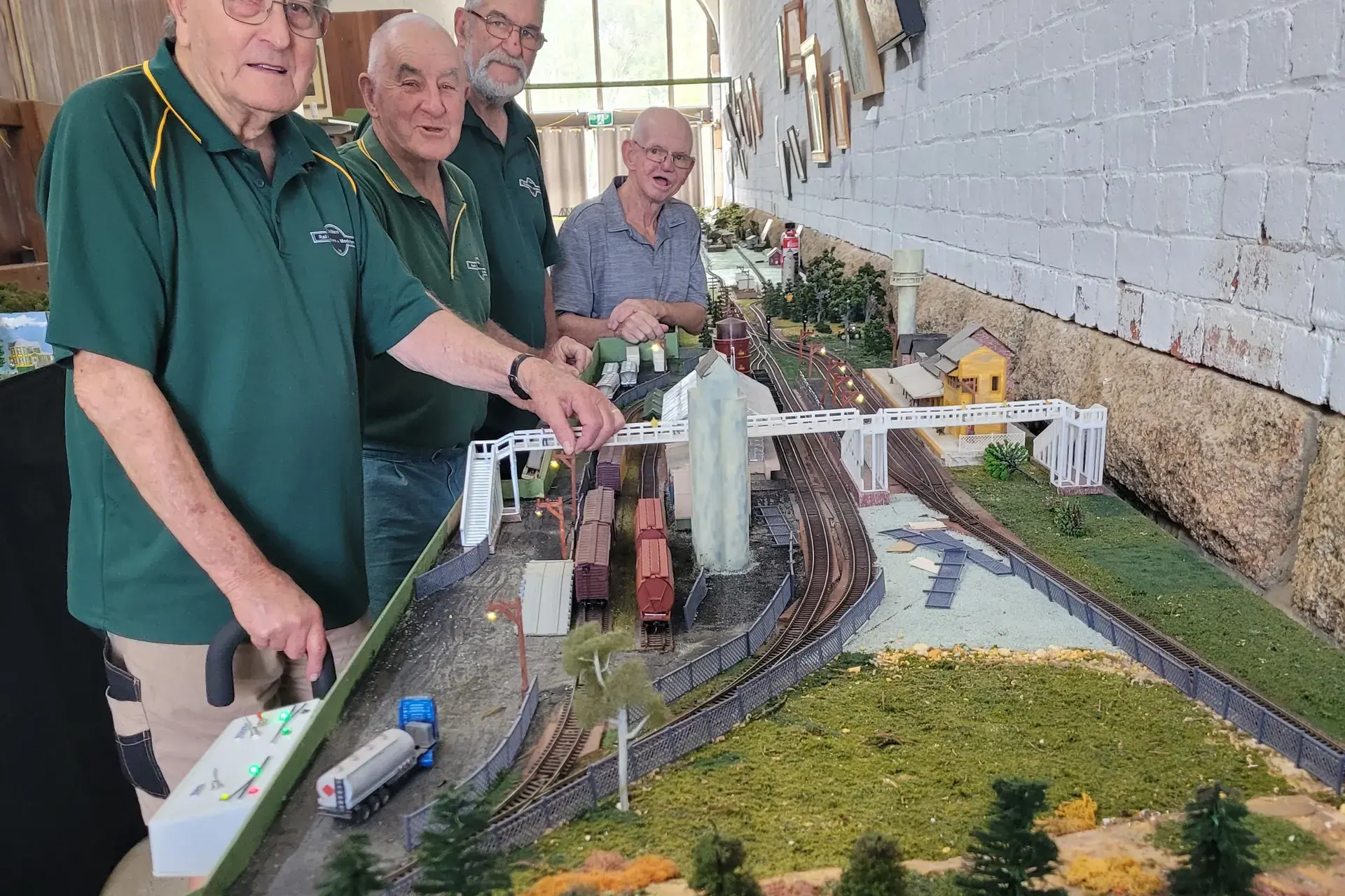 <p>KICKED OUT: Railroaders and Modeller\\u2019s group members Denis Murray (left), Barry Rogers, Keith Grigsby and Steve Noonan at the group\\u2019s last opening at the Goods Shed last weekend. PHOTOS: Coral Cooksley</p>\\n