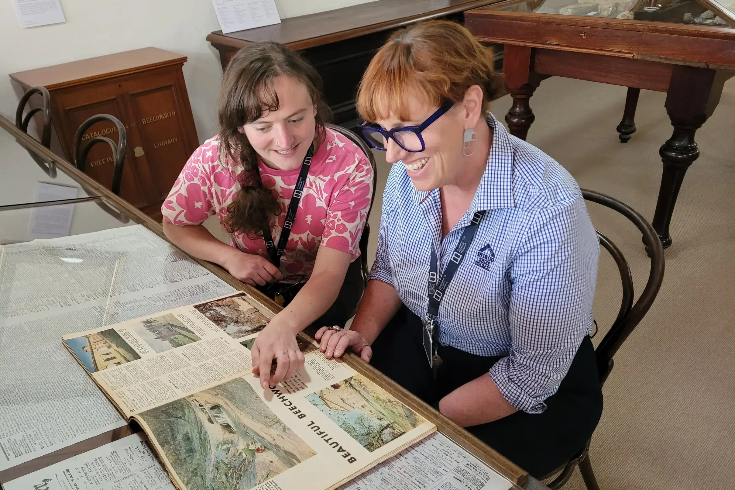 <p>INTRIGUING READ: Burke Museum collection manager Molly Culbertson (left) with the museum\\u2019s schools and public education officer Sally Huguein enjoy reading the late 60s Women\\u2019s Weekly article about Beechworth. PHOTOS: Coral Cooksley</p>\\n