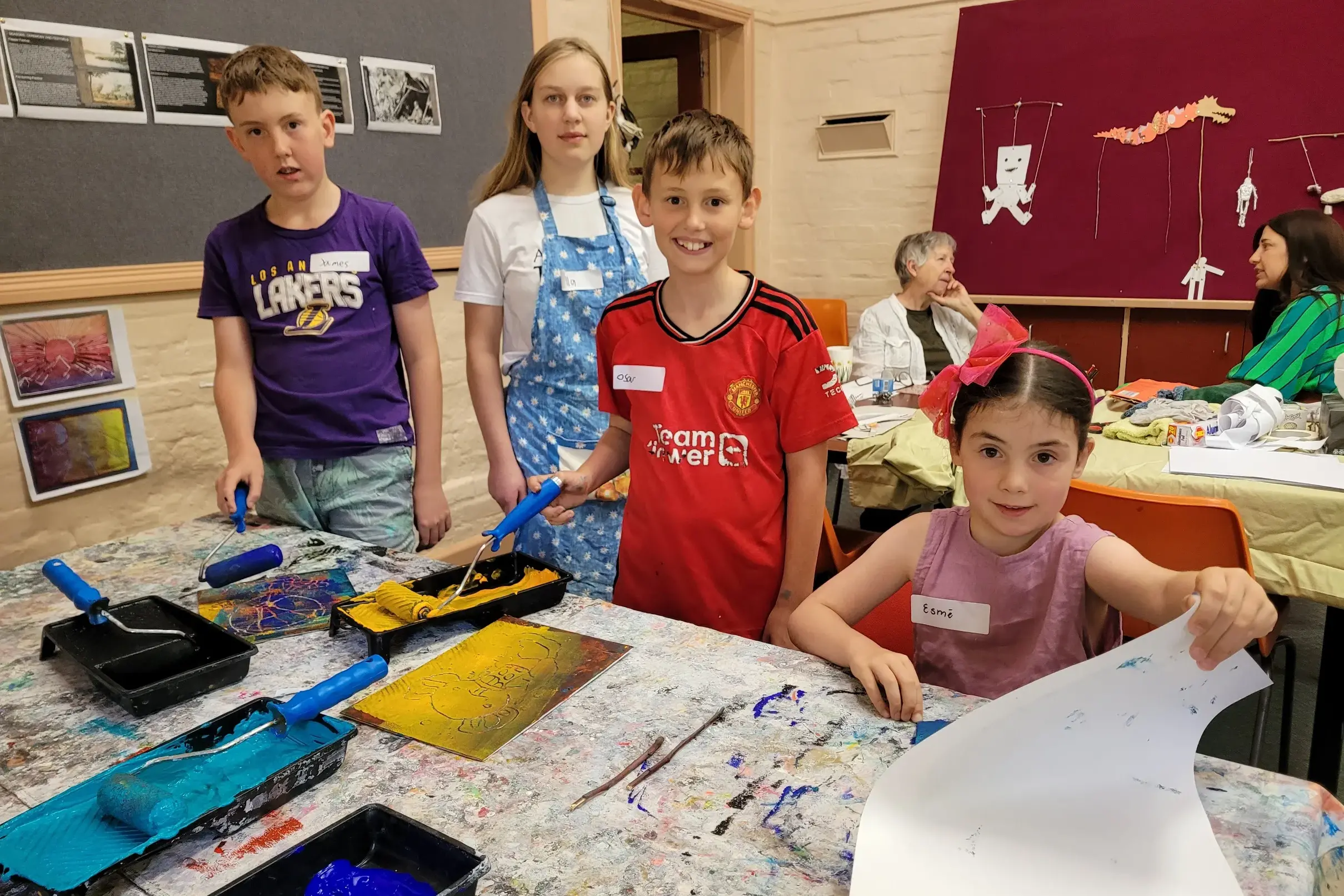 <p>CREATIVE: Young workshop participants James Cator (11) on the left, Ella Weber (helper), Oscar Cator (9) and Esm\\u00E9 Halleur (6) with Stanley artist Mary-Rose Riley and Stanley Community Playgroup\\u2019s Mallory Watson in the background at the children\\u2019s art workshop on Saturday. PHOTO: Coral Cooksley</p>\\n
