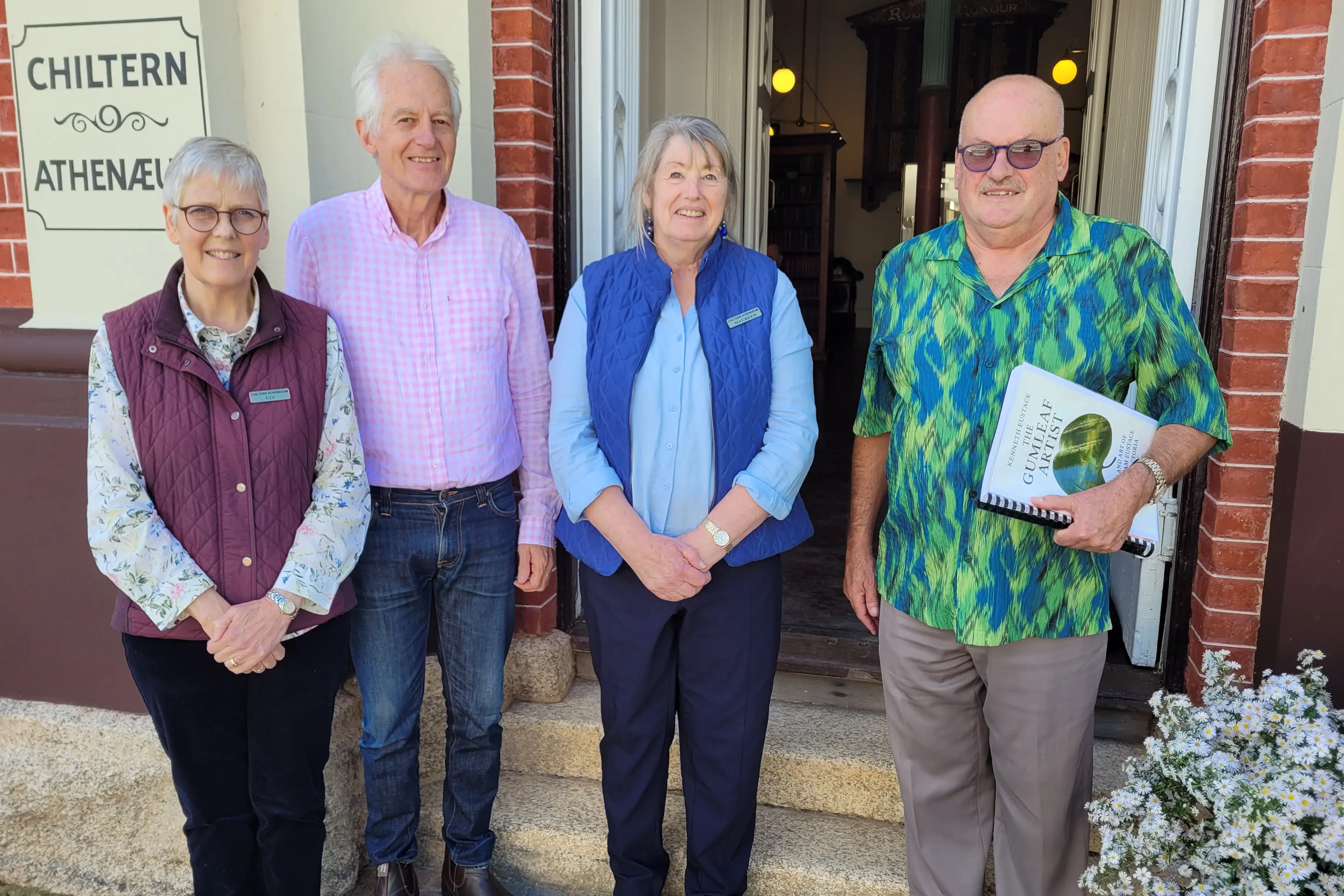 <p>HAPPY: Chiltern Athenaeum committee co-chair Viv Burnett (left), great-great-grandson of gum leaf artist Alfred William Eustace, Chiltern Athenaeum Trust committee co-chair Maureen Everitt and great-great-grandson of Albert and author Ken Eustace at the opening for the local community. PHOTO: Coral Cooksley </p>\\n