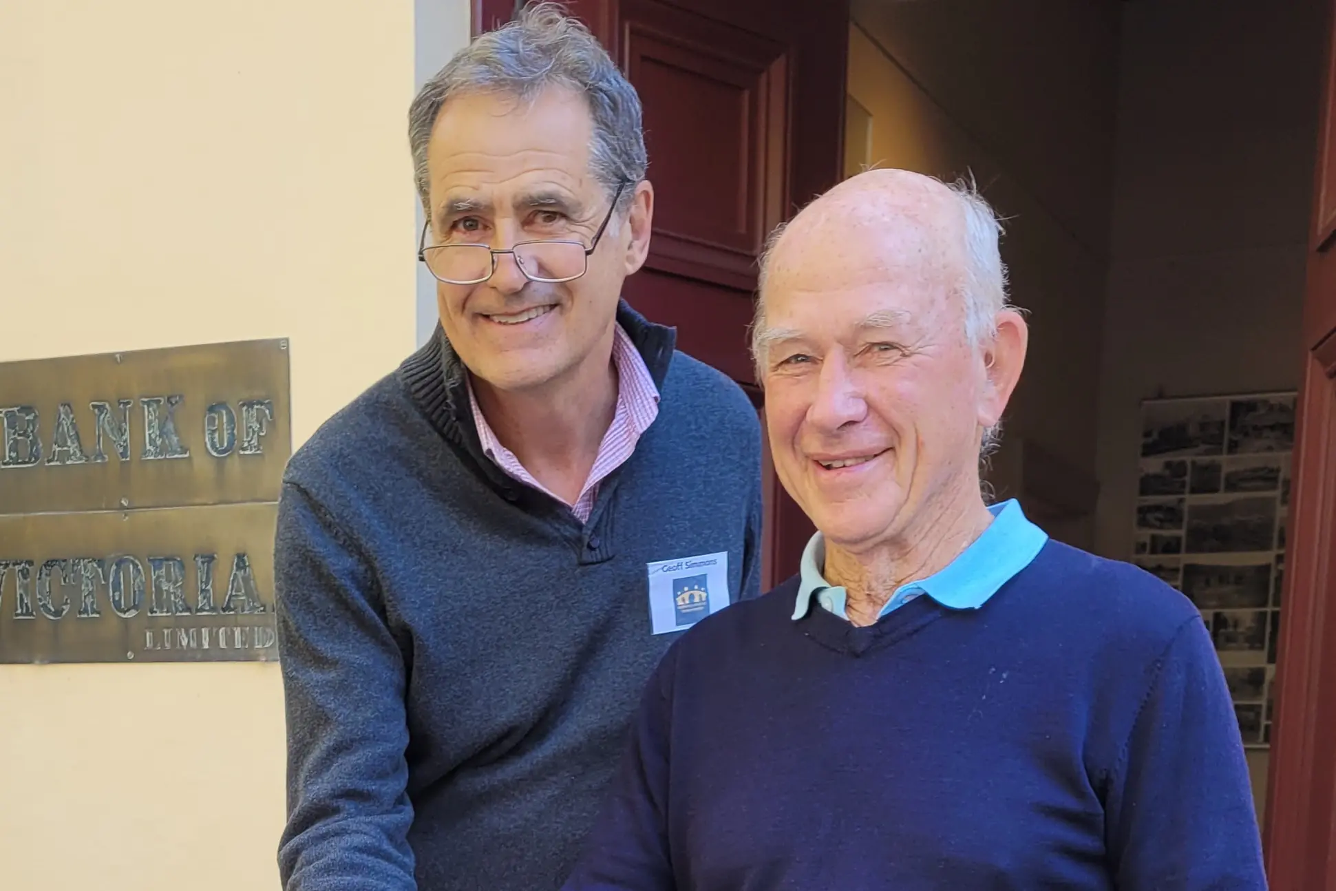 <p>CUT: History group member and Wellbeing Advocacy Yackandandah (WAY) president Geoff Simmons with Donald Crosthwaite ready to cut the special cake for the exhibition launch at the Yackandandah Museum last Friday. PHOTO: Coral Cooksley</p>\\n