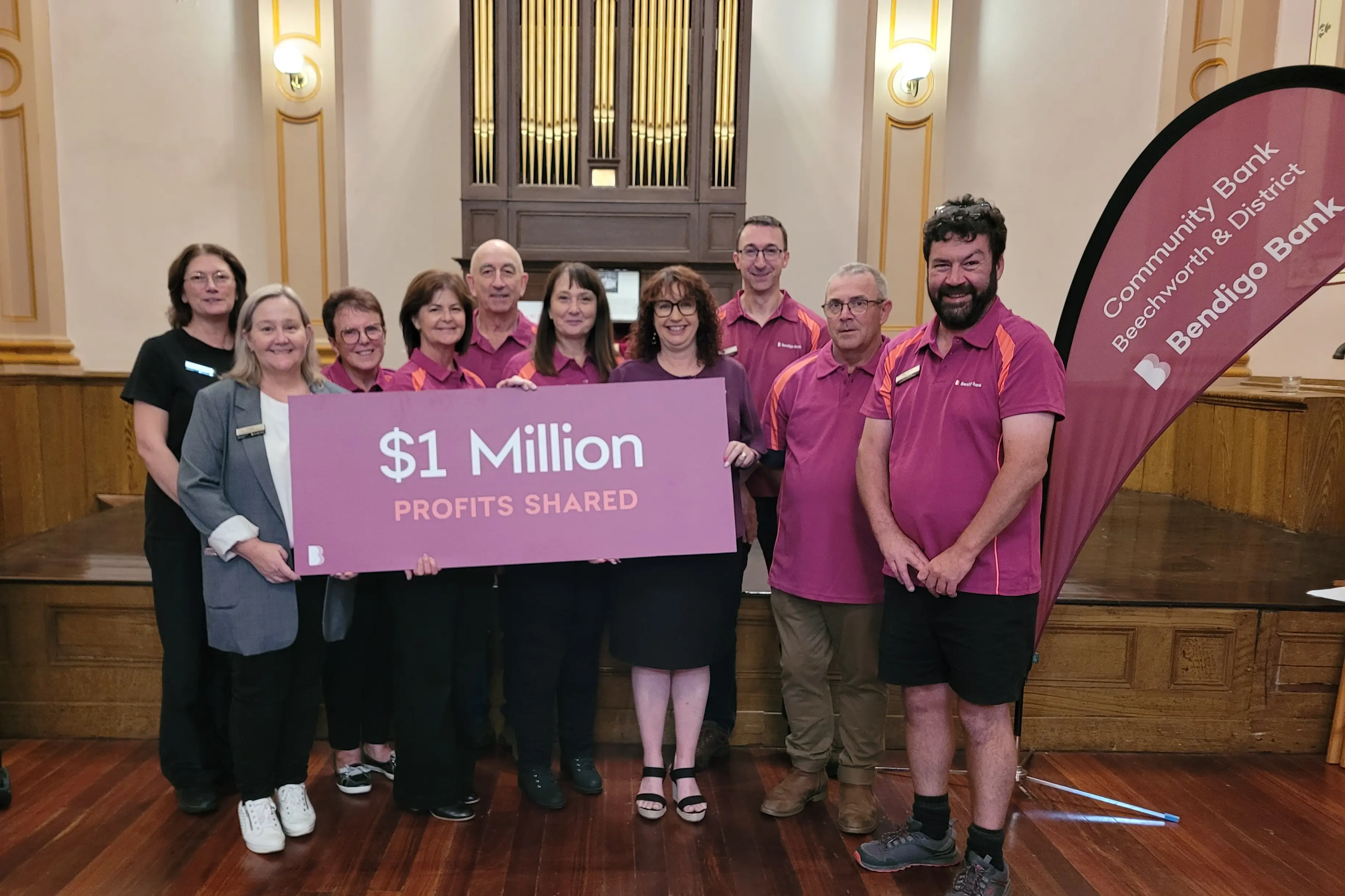 <p>ALL SMILES: Community Bank Beechworth and District (Bendigo Bank) board and staff members excited to have reached a million-dollar reinvestment into the local community. PHOTO: Coral Cooksley</p>\\n