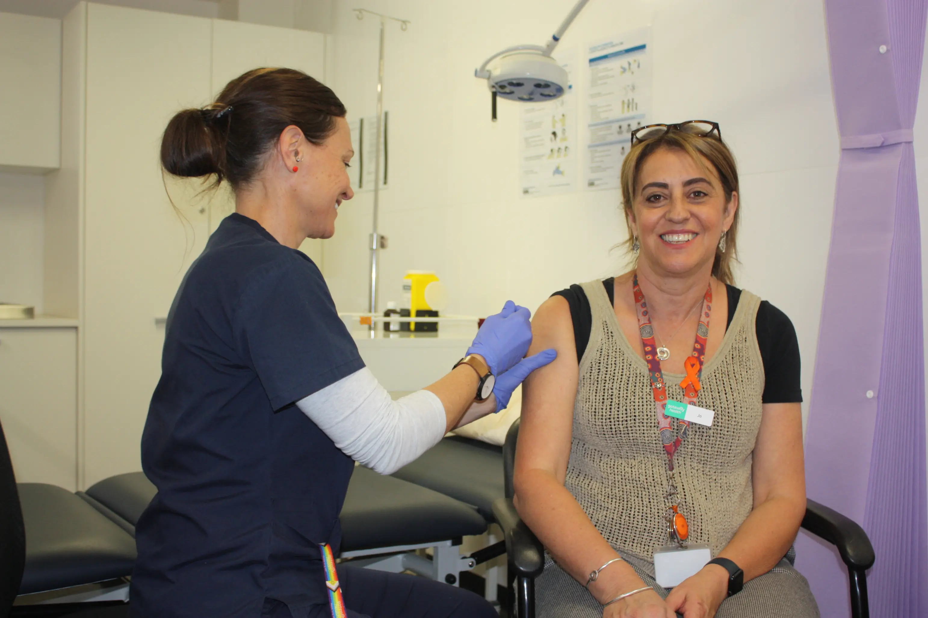 <p>SLEEVES UP: Gateway Health practice nurse Meg Tonkin administers the flu vaccine to practice manager Jo Zamperoni. PHOTO: Grace Fredsberg </p>\\n