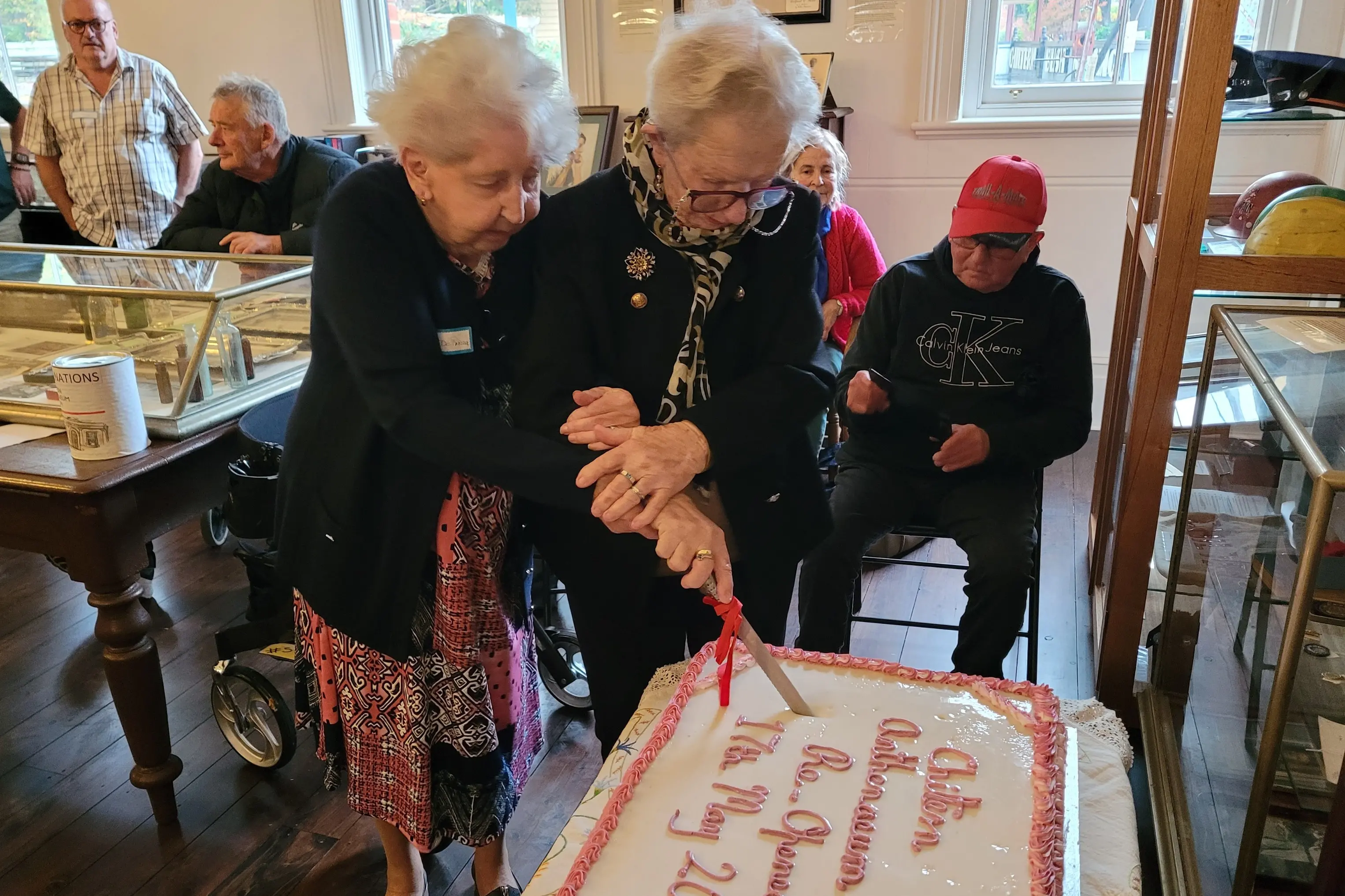 <p>SPECIAL: Chiltern\\u2019s Eunice De Piazza (left) and Mary Fuge shared a proud moment in cutting the celebration cake to mark the Athenaeum\\u2019s re-opening. PHOTOS: Coral Cooksley</p>\\n
