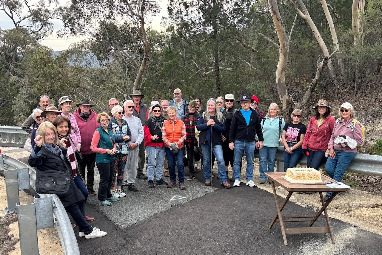 <p>GORGE CAKE: Walkers gathered at Gorge Road\\u2019s closed bridge on Saturday to celebrate the road and bridge birthdays with cake generously made and provided by Jo and Marty Matassoni and team at Beechworth Bakery. PHOTO: Peter Kenyon</p>\\n