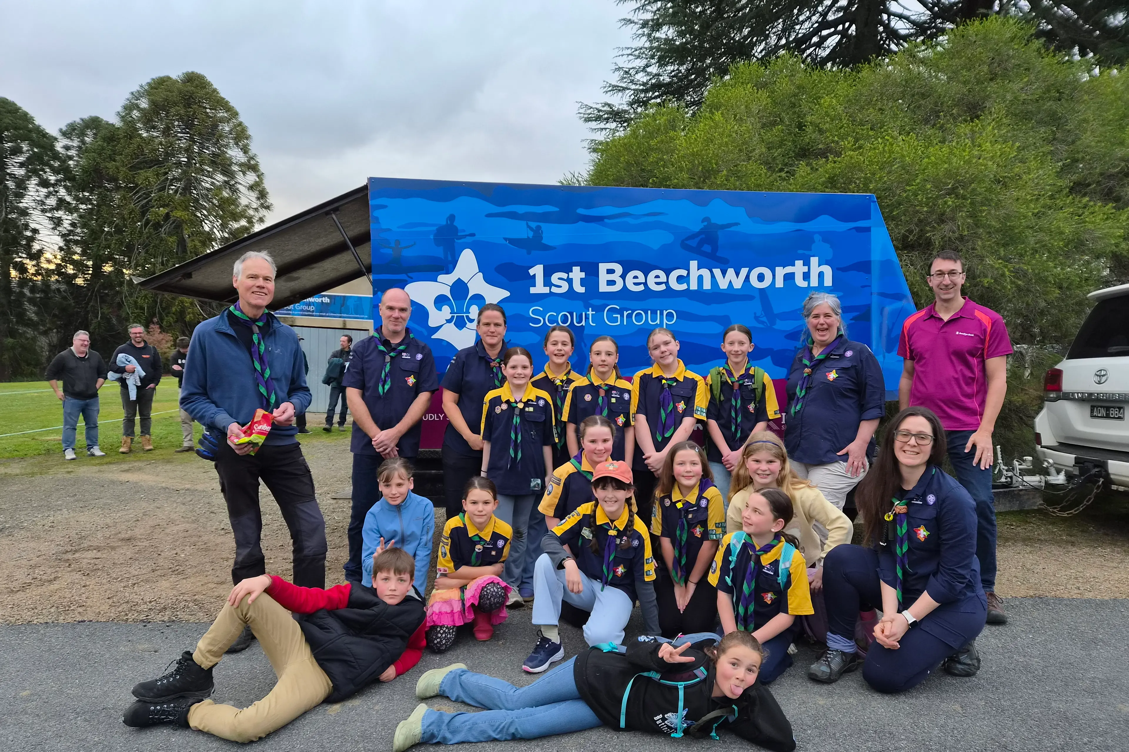 <p>EXCITED: 1st Beechworth Scouts Group cubs and leaders with Community Bank Beechworth & District (Bendigo Bank) Board member Mark Roach (back right) before the Scout group set off to Benalla.</p>\\n