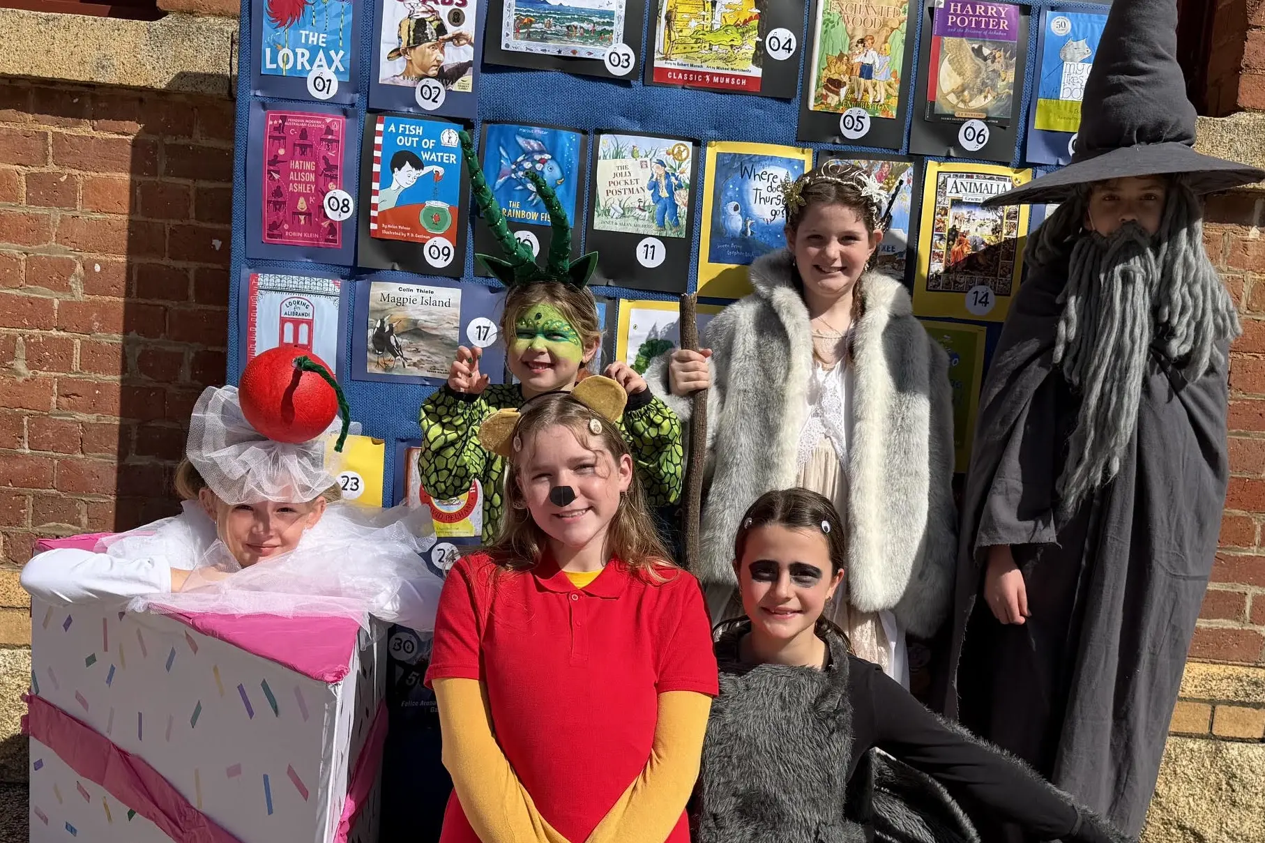 <p>COLOURFUL CHARACTERS: Beechworth Primary School students Laurie Bird (recipe book cake), Charlie Hunter (Quinn the treasure dragon), Mia Fitridge (Winnie the Pooh), Hazel Roach (Aragog the Spider) and Ewen Alderton (Gandalf) had fun at Book Week celebrations last Friday.</p>\\n