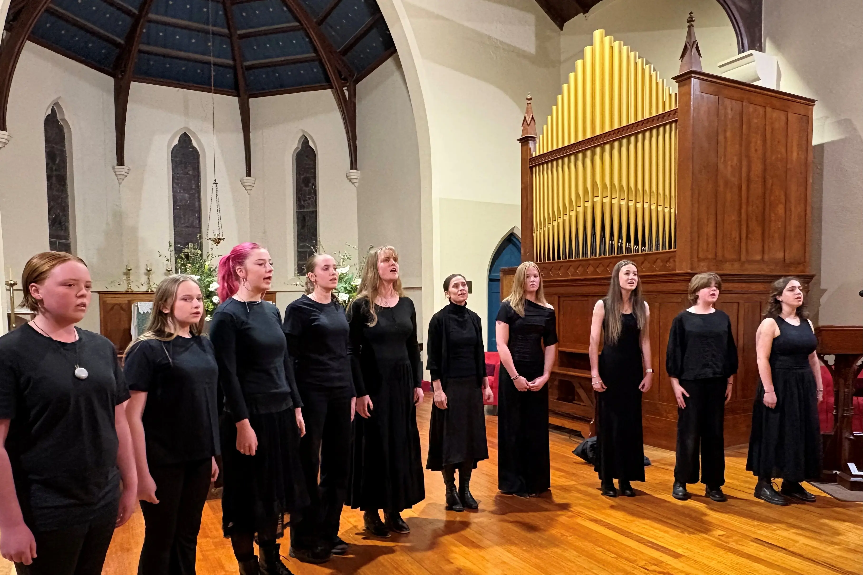 <p>UNACCOMPANIED: Eleanor Glanville, Maddie Prentice, Poppy Hunt, Saoirse Beatty, Irena Purnell, Amber Vincent, Elvie Evans-Barr, Willow Anderson, Elena Dean and Evie Donoso-Harrison at the Christ Church concert. PHOTO: Patricia Broom</p>\\n