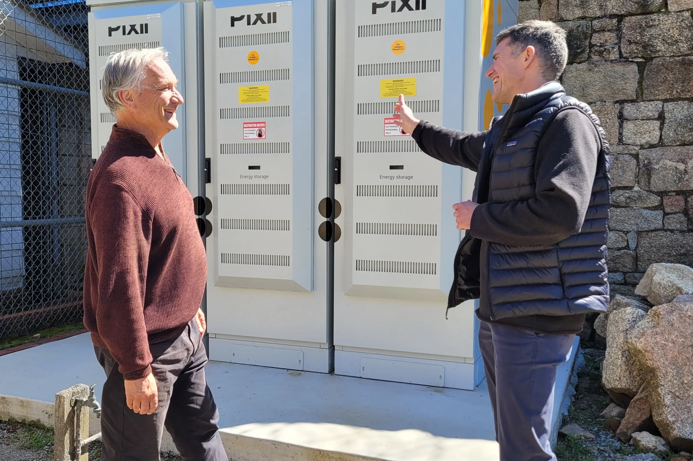 <p>ENERGY RESILIENCE: Green\\u2019s candidate for the seat of Benambra Graham Parton chats to Indigo Power managing director Ben McGowan about the community battery installed at the Old Beechworth Gaol earlier this year. PHOTO: Coral Cooksley</p>\\n