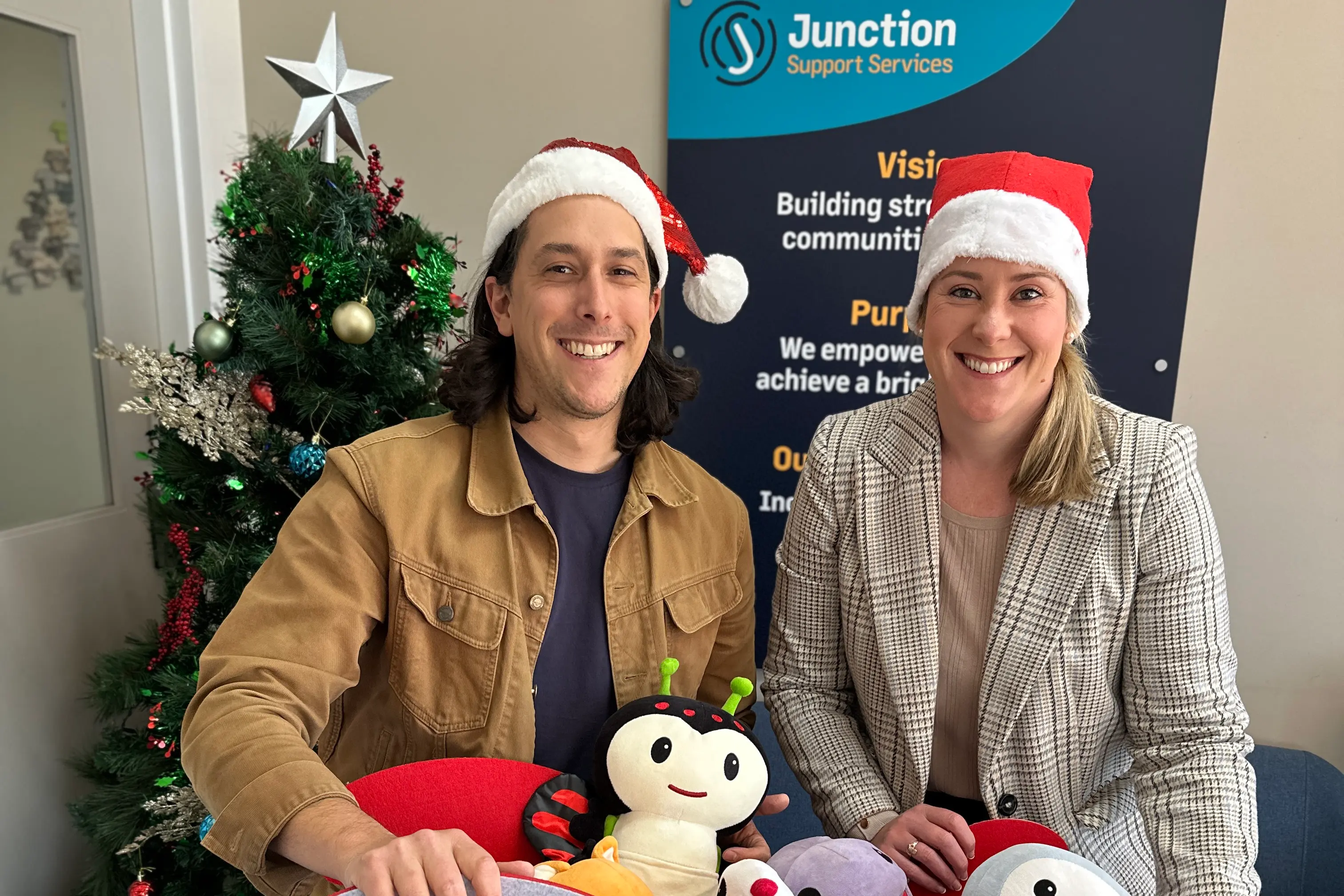 <p>GIVE FROM THE HEART: Junction\\'s Gift Drive coordinator Ben Corio (Junction\\u2019s community engagement and impact manager) and Angela Kavanagh (children\\u2019s specialist worker) at Junction Support Services Wangaratta Office at Unit 2/54 Ovens St, one of the local drop-off location for those able to give. </p>\\n
